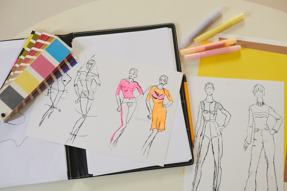 Sketches of outfits by a fashion designer