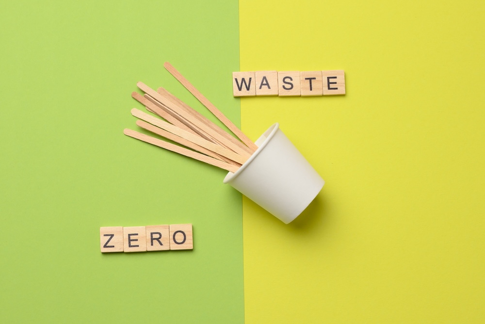 Zero waste wooden sticks inside a disposable paper cup