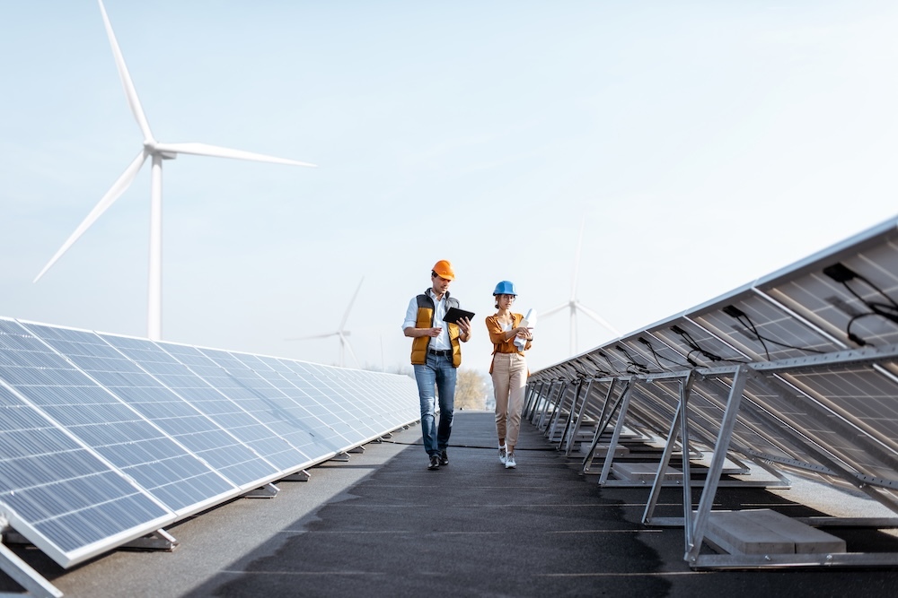 engineers walking at a solar power plant