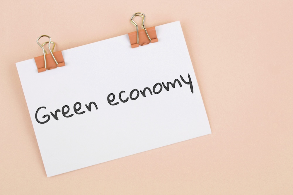 Green economy written on an index card