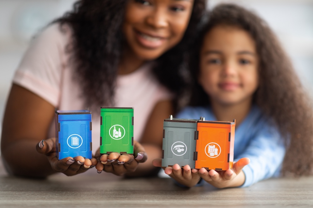 Mother and daughter together being environmentally conscious