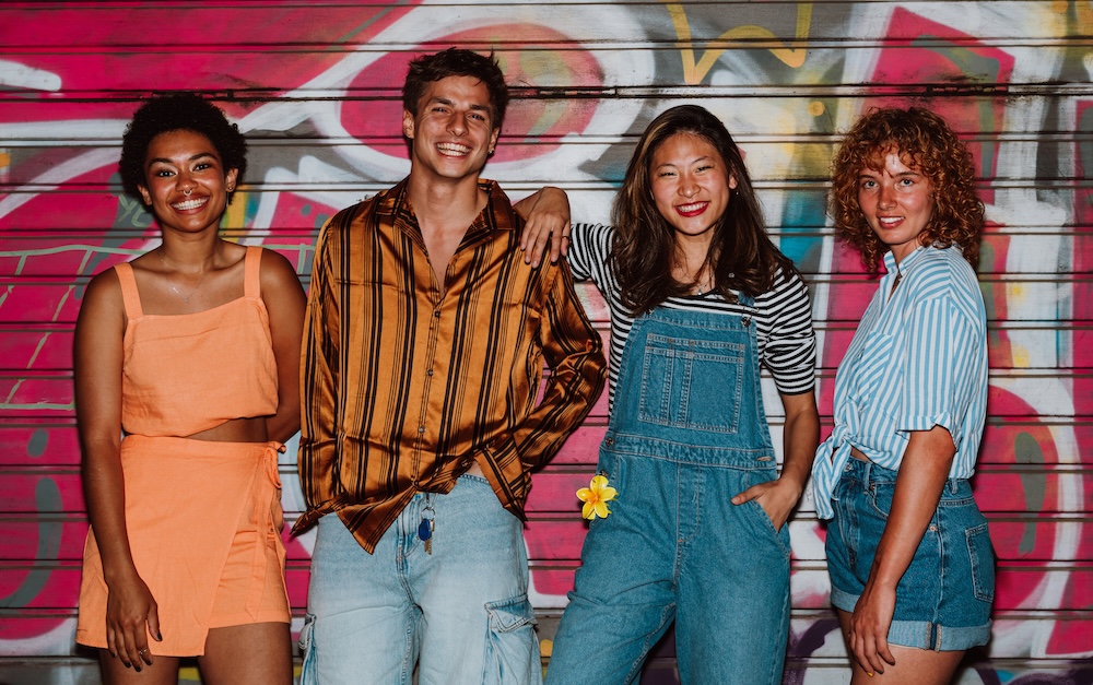 Friends hanging out with Y2K and unique fashion styles