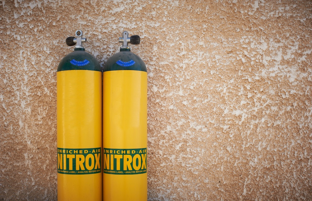 two yellow nitrogen scuba tanks