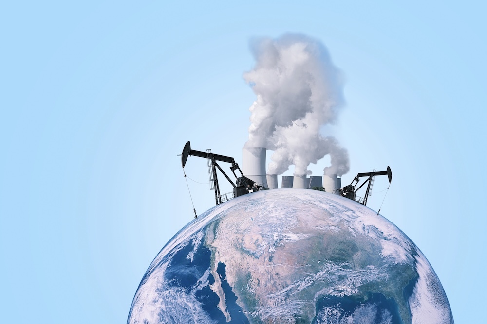 planet with oil drills and pollution coming out of the top