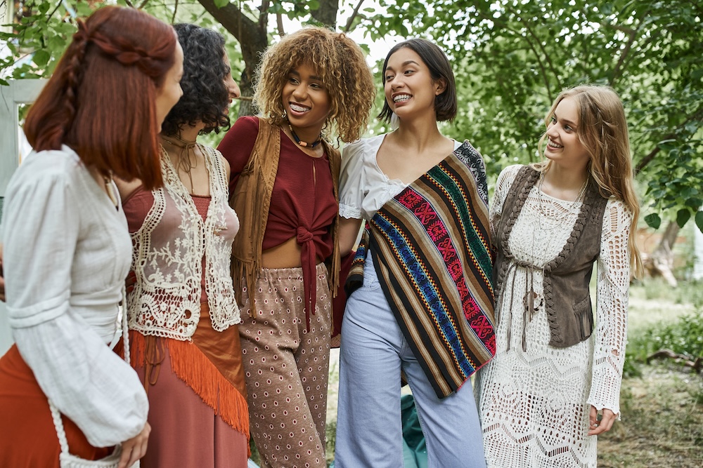 multi-cultural friends wearing stylish sustainable clothing
