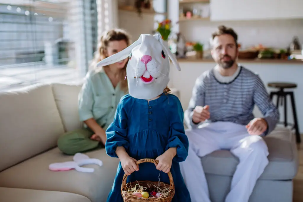 girl with family holding easter basket
