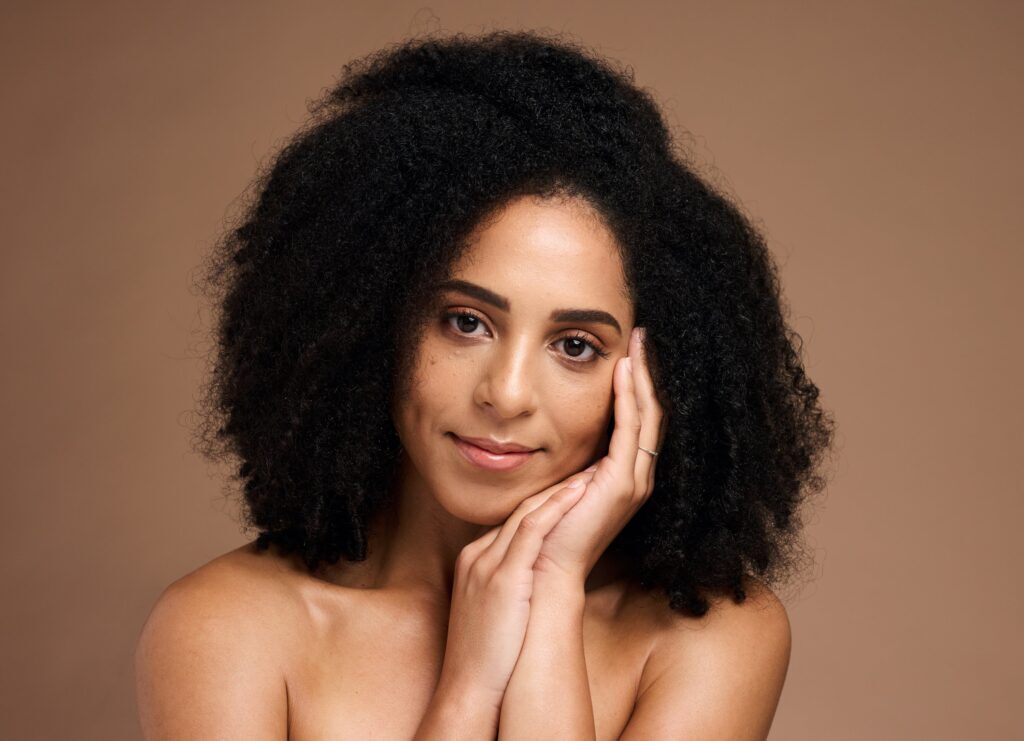 Beautiful young woman with glowing skin