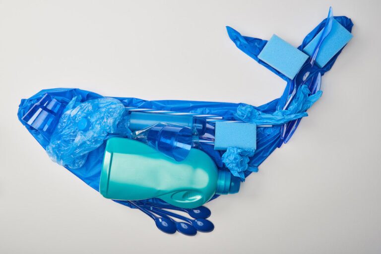 Whale shaped out of ocean plastic