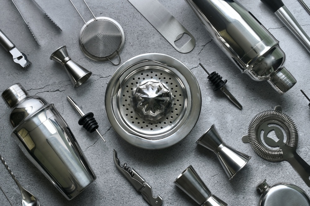 stainless steel utensils on a flat surface