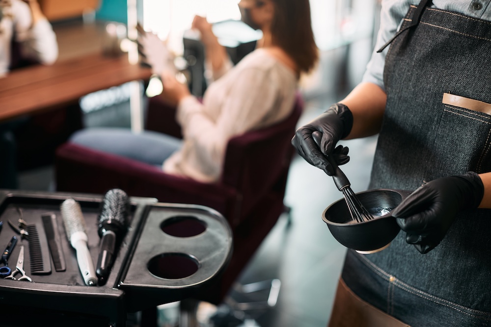 hairstylist mixing hair dye