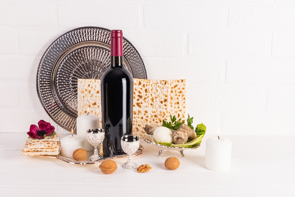 passover meal spread on a white background