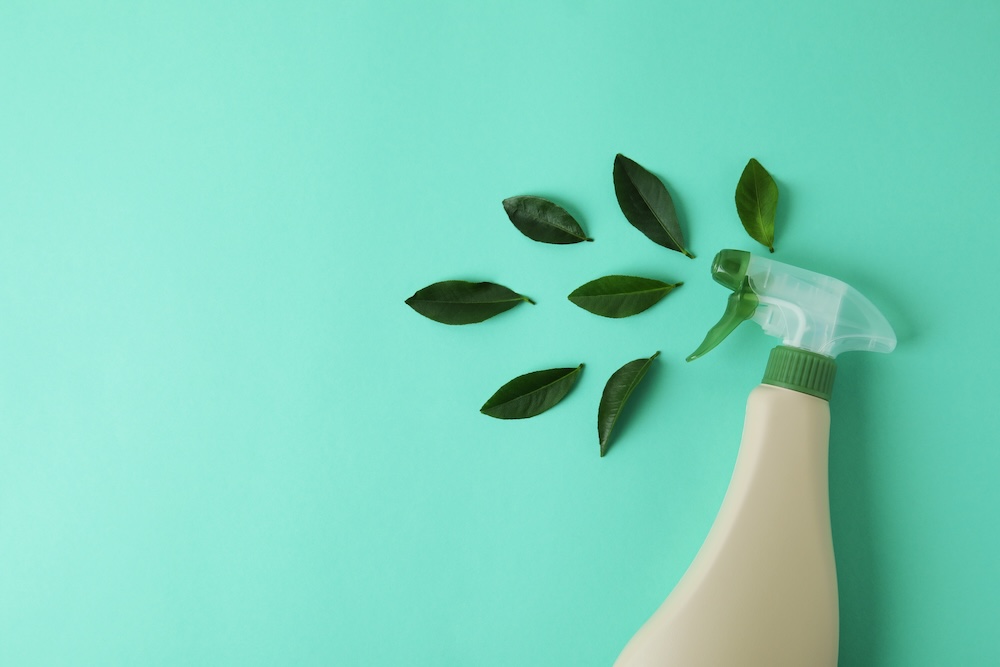 plastic squirt bottle with leaves coming out
