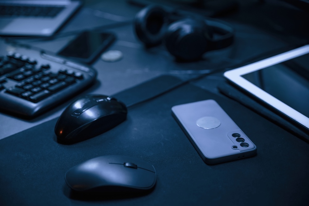 closeup of digital devices on a desk