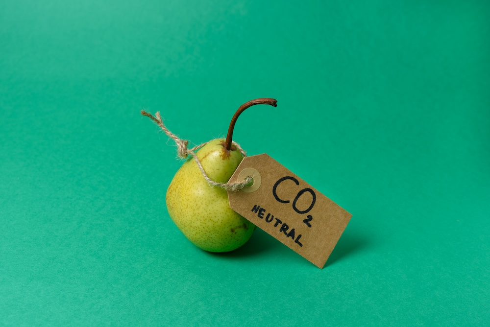 fresh pear with a CO2 neutral label