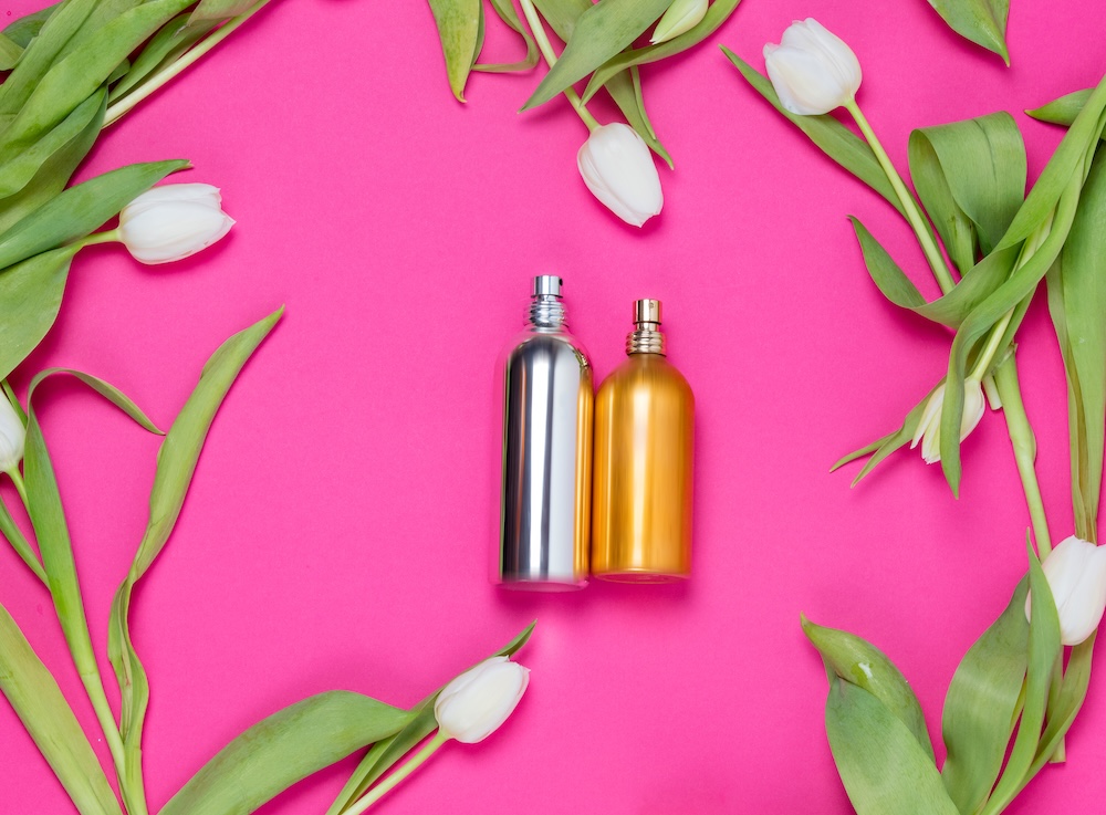 synthetic Fragrances bottles on a pink background