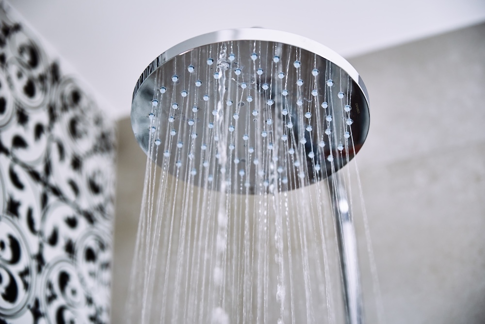 large shower head pouring water