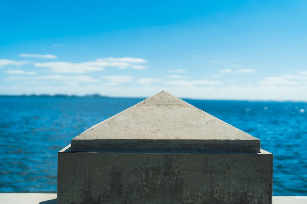 concrete structure next to the ocean