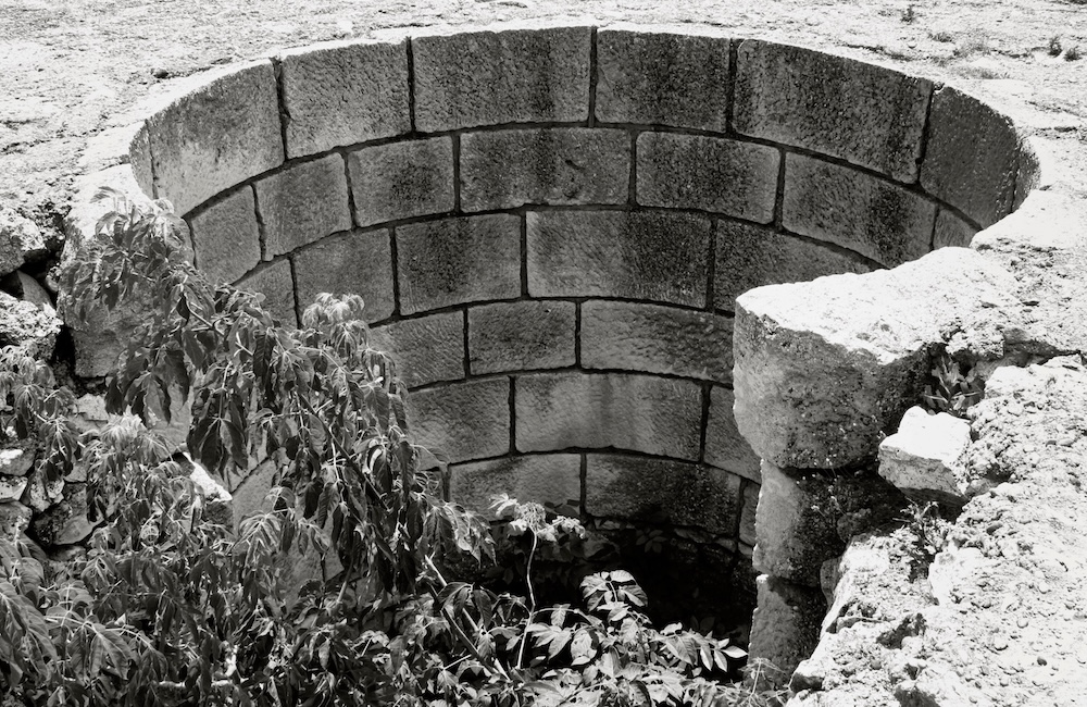 old well that is dry with no water
