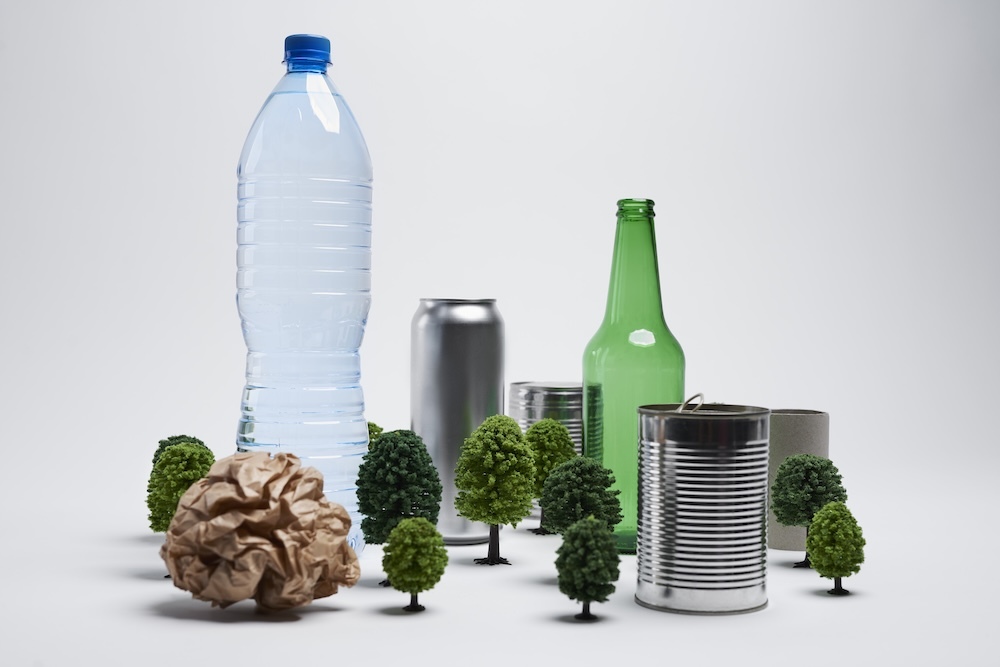 Concept of recycling garbage with small trees