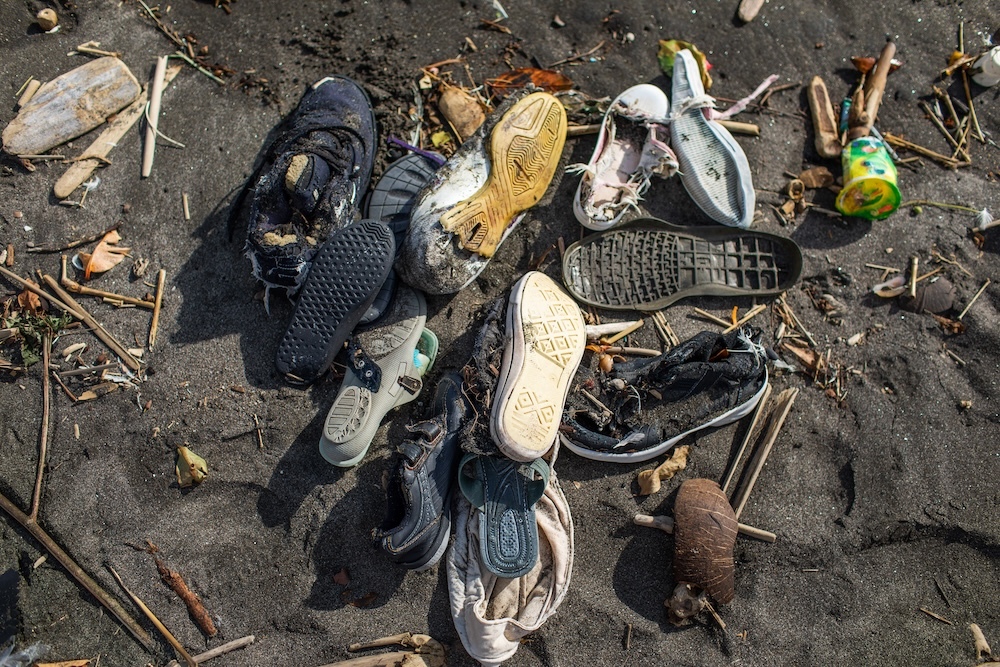 environmental shoe pollution with rubber shoes in dirt