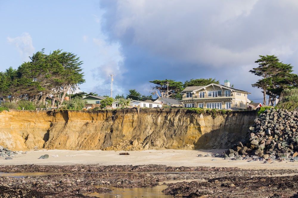 beach house on the edge of beach erosion