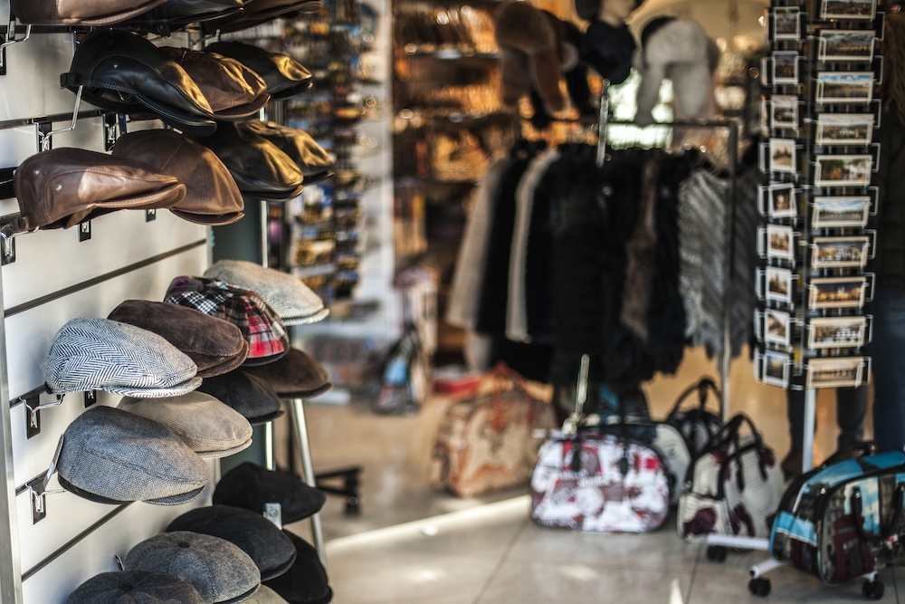 Gently used thrift shop with hats and bags