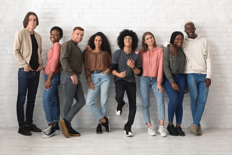 diverse group of people wearing jeans