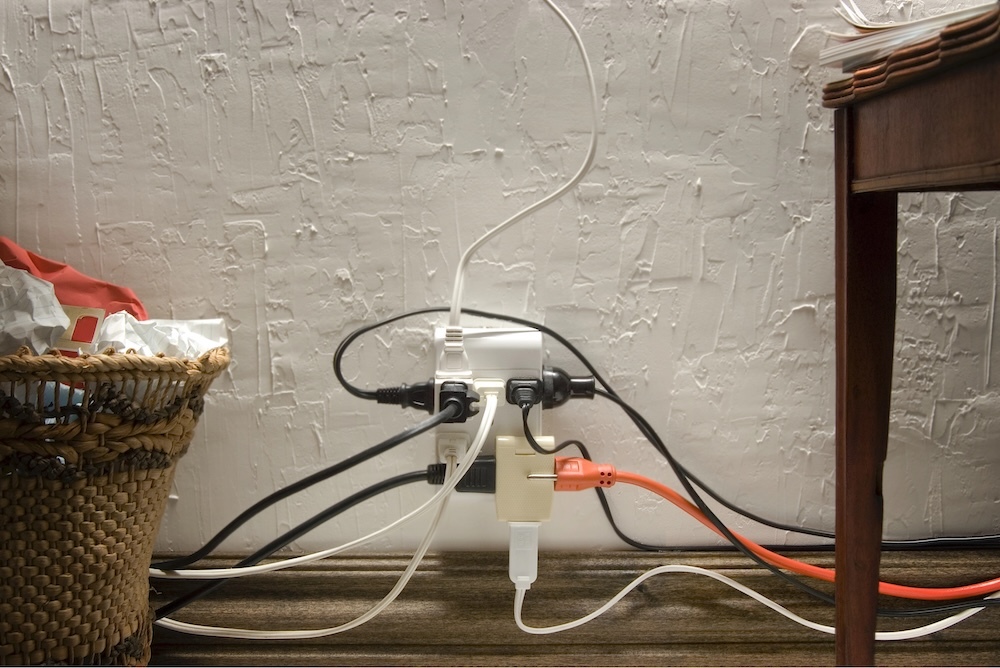 overloaded electrical outlet with phantom power running