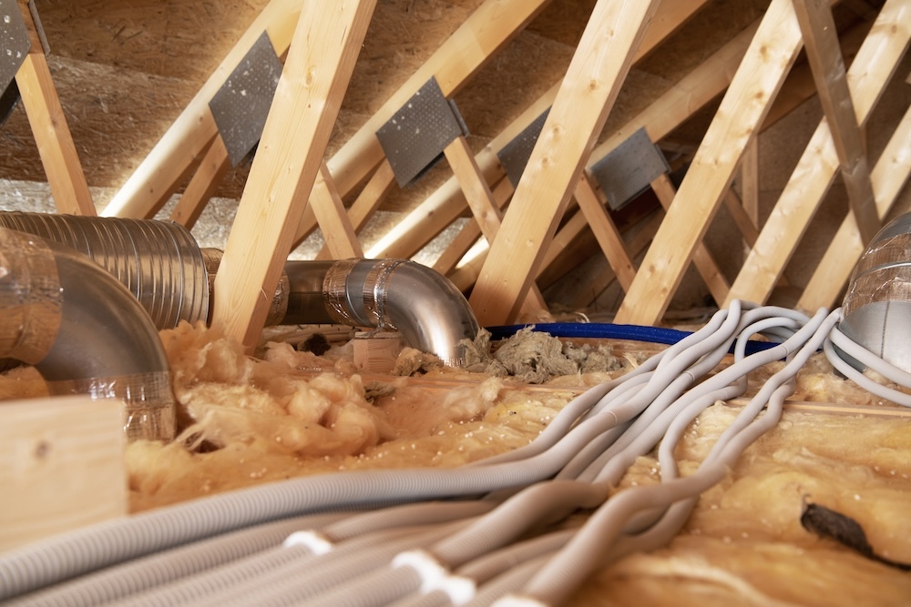 attic with dust hvac and insulation