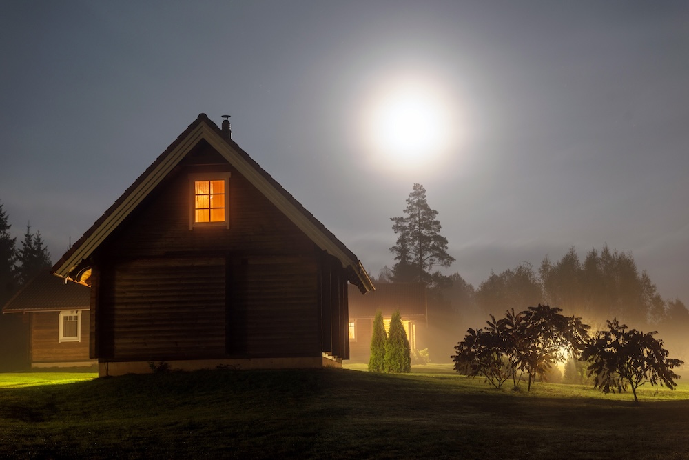 rural guest house with moonlight in the sky