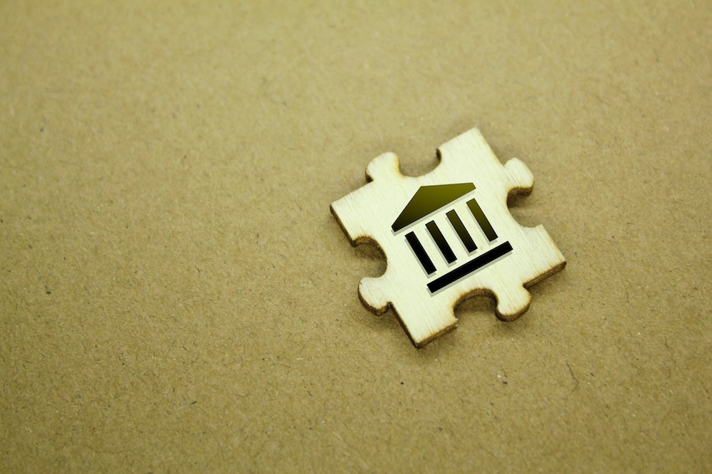 bank icon on a puzzle piece