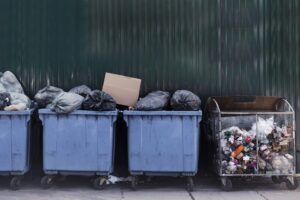 Dumpsters full of garbage and recycling