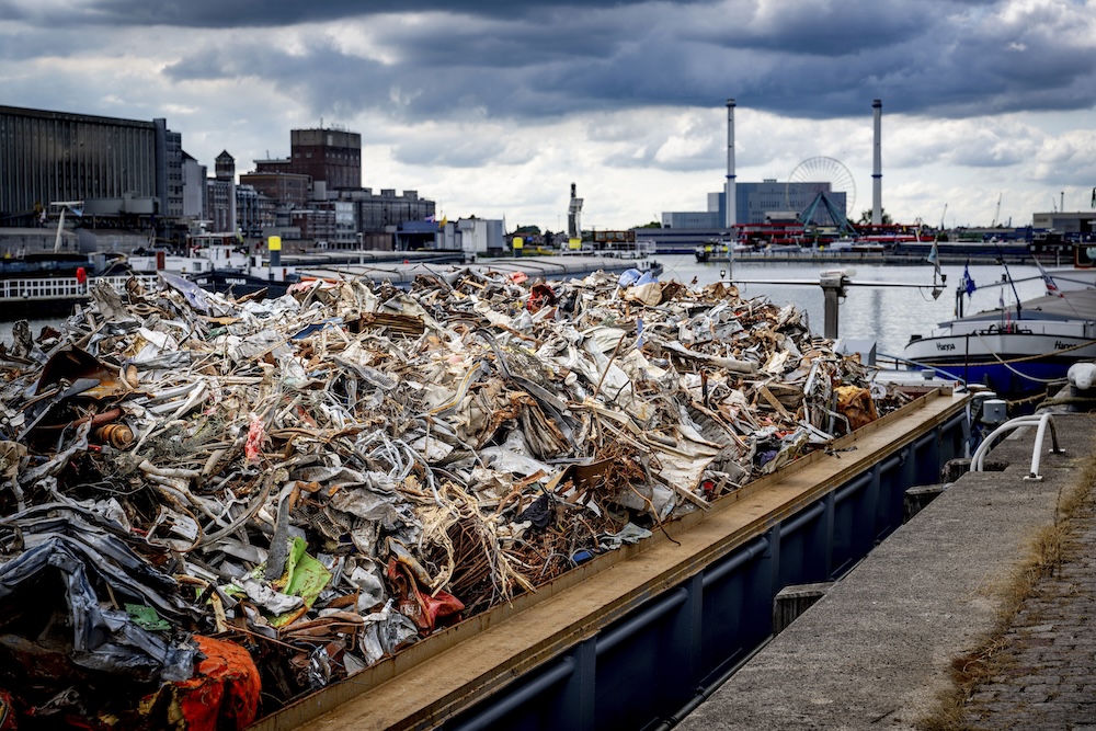 garbage and scrap metal loaded on a vessel