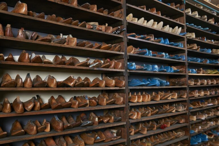 Wooden shoes on shelves in a shoe factory