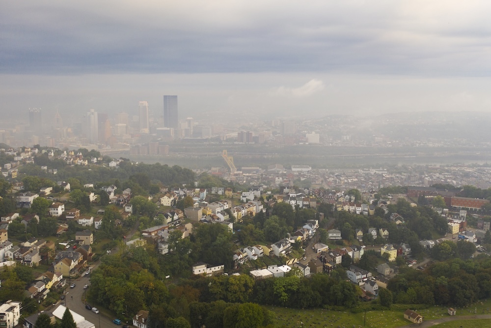 Smog over city and suburban neighborhood