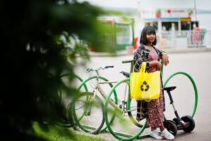 Woman using a cycle and reusable bag