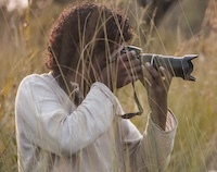 Man taking photo of wildlife