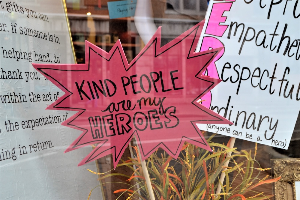 Signs that say kind people are my heroes