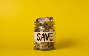 Saving money in a reusable glass jar