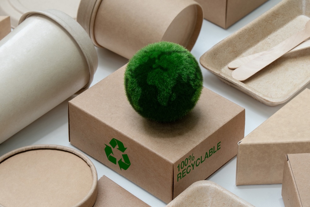 eco-friendly packaging with a mossy green earth on top