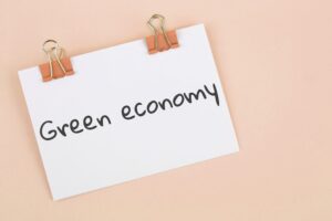 Green economy written on an index card