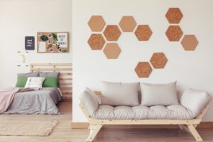 Cork pieces on the wall above wooden furniture