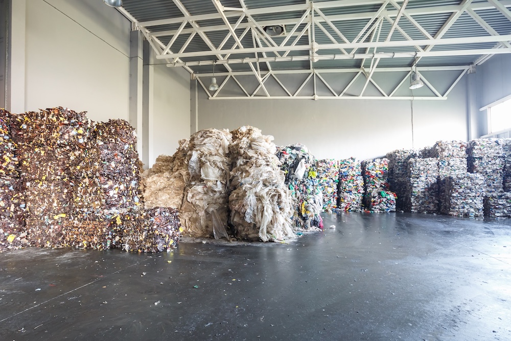 Modern waste facility with bales of sorted plastics