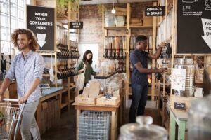 People grocery shopping a zero waste store