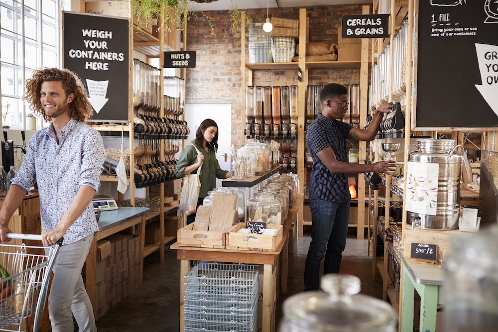 People grocery shopping a zero waste store