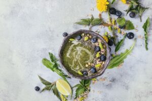 Plant-based Nettle and dandelion smoothie bowl