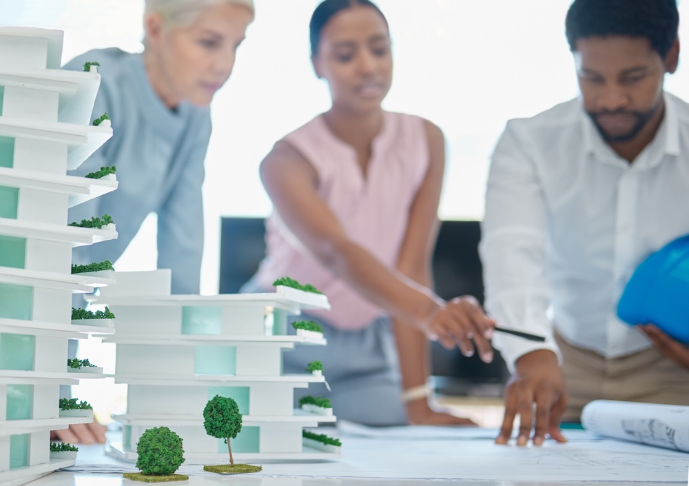 architect and engineers planning a sustainable building design