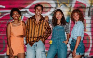 Friends hanging out with Y2K and unique fashion styles
