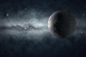 moon and the milky way glowing in the darkness