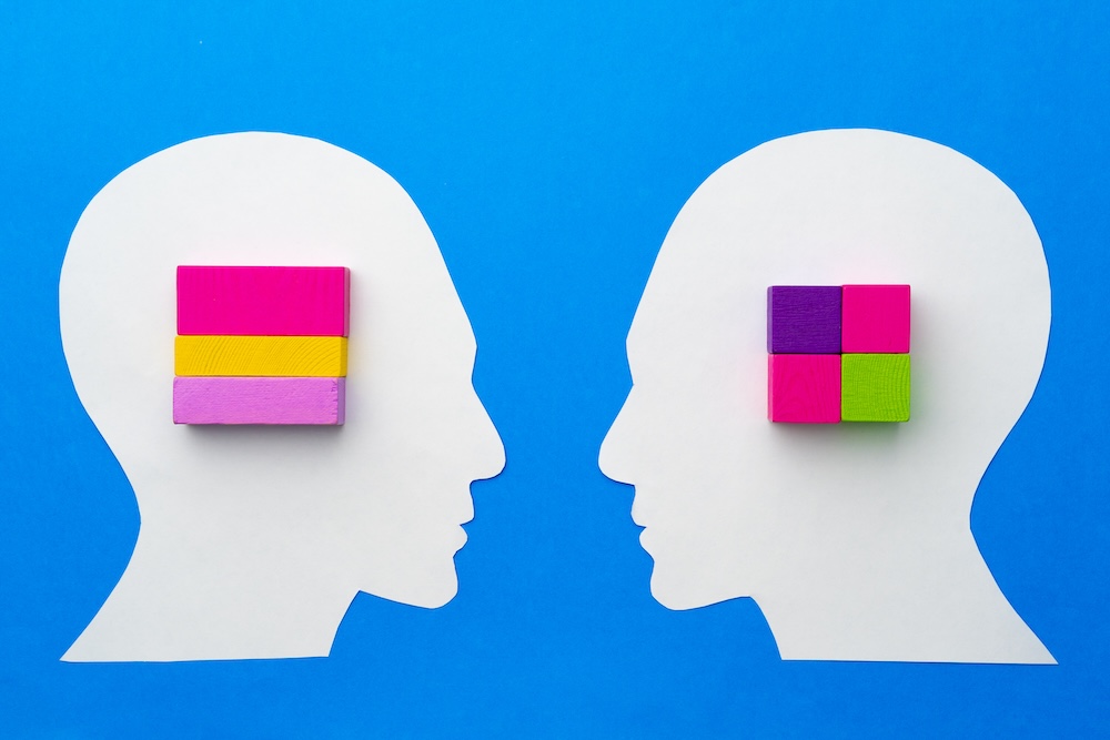 Paper heads with different shaped colorful boxes inside
